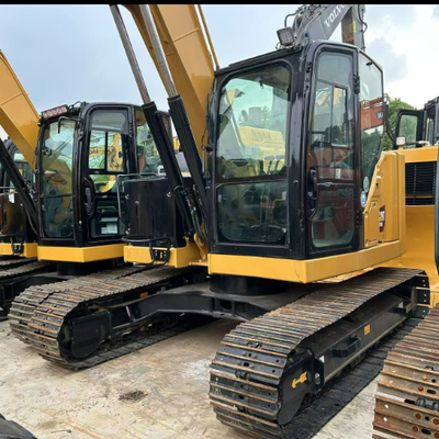 การจัดการไม้ ใช้ Caterpillar CAT 310 ใช้ เครื่องขุดไฮดรอลิกหมุน